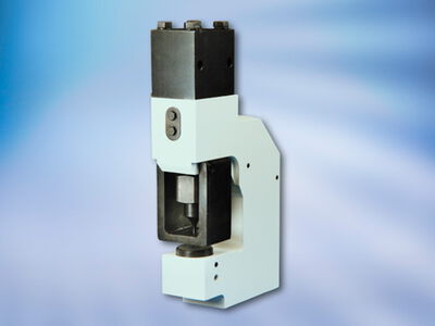 Hydraulic punching yokes by PETIG (similar picture).